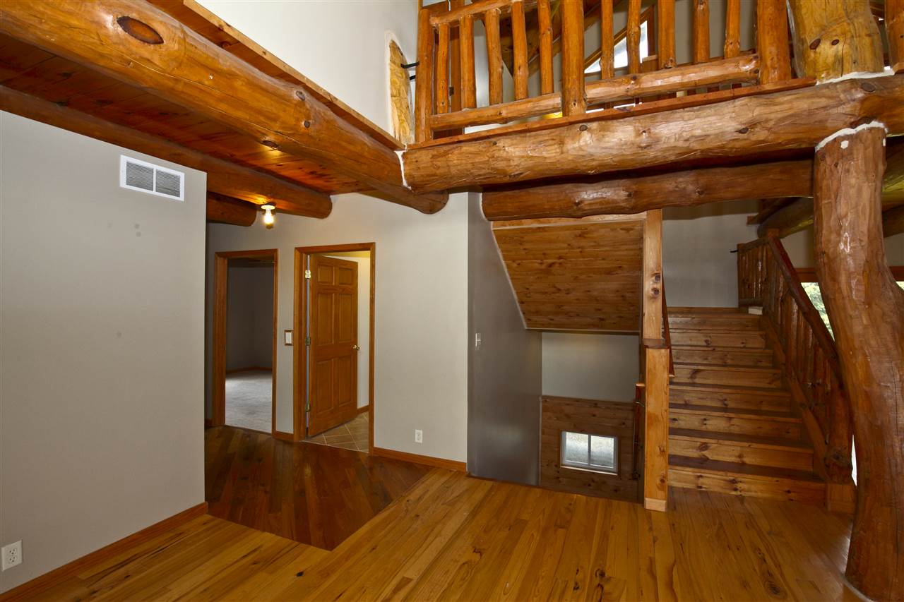20100 Grade School Road Caledonia, IL 61011 - Photo 8 of 21 a view of an entryway with wooden floor