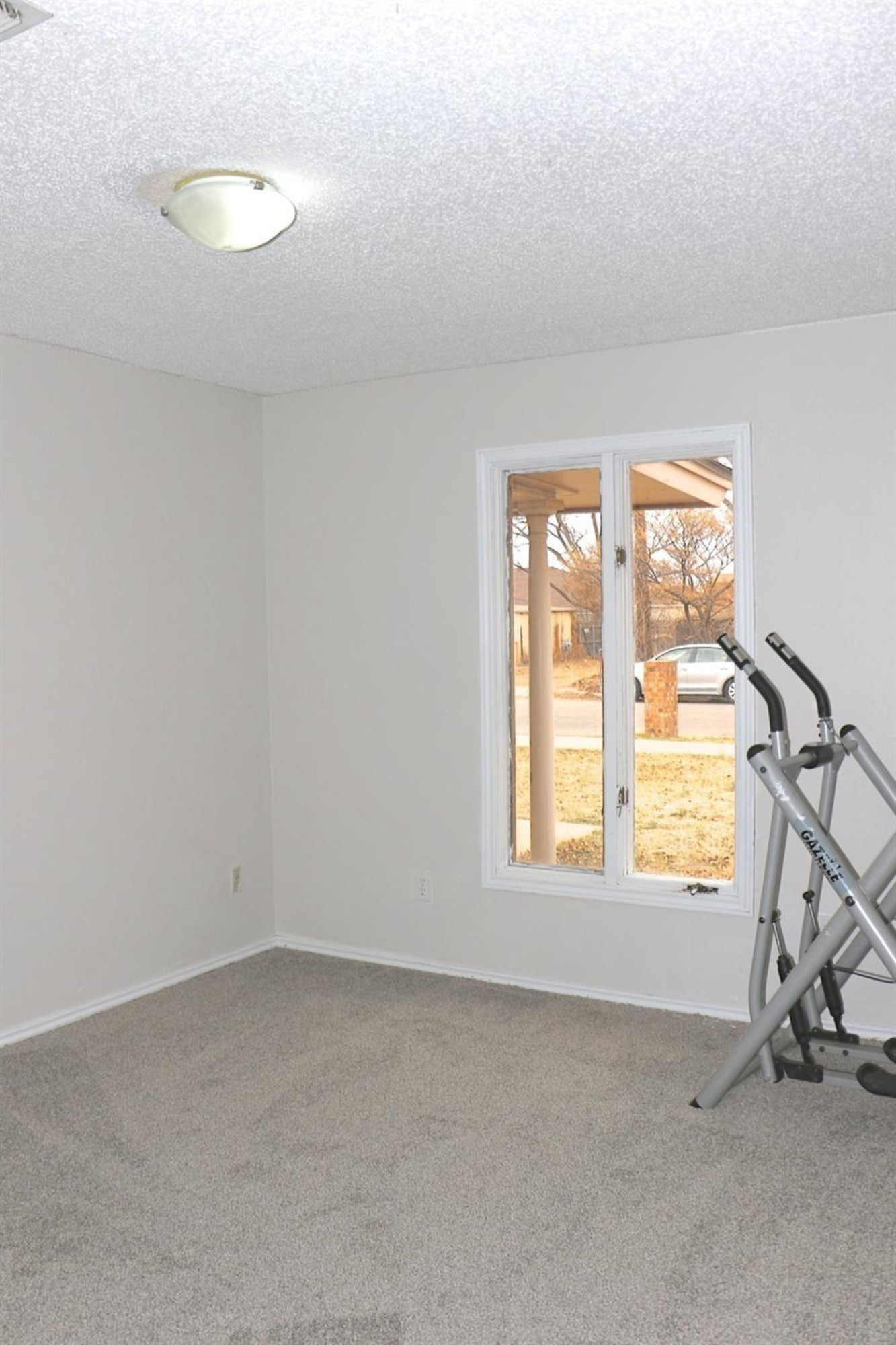 7004 Elkhart Avenue Lubbock, TX 79424 - Photo 11 of 16 a view of a room with gym equipment