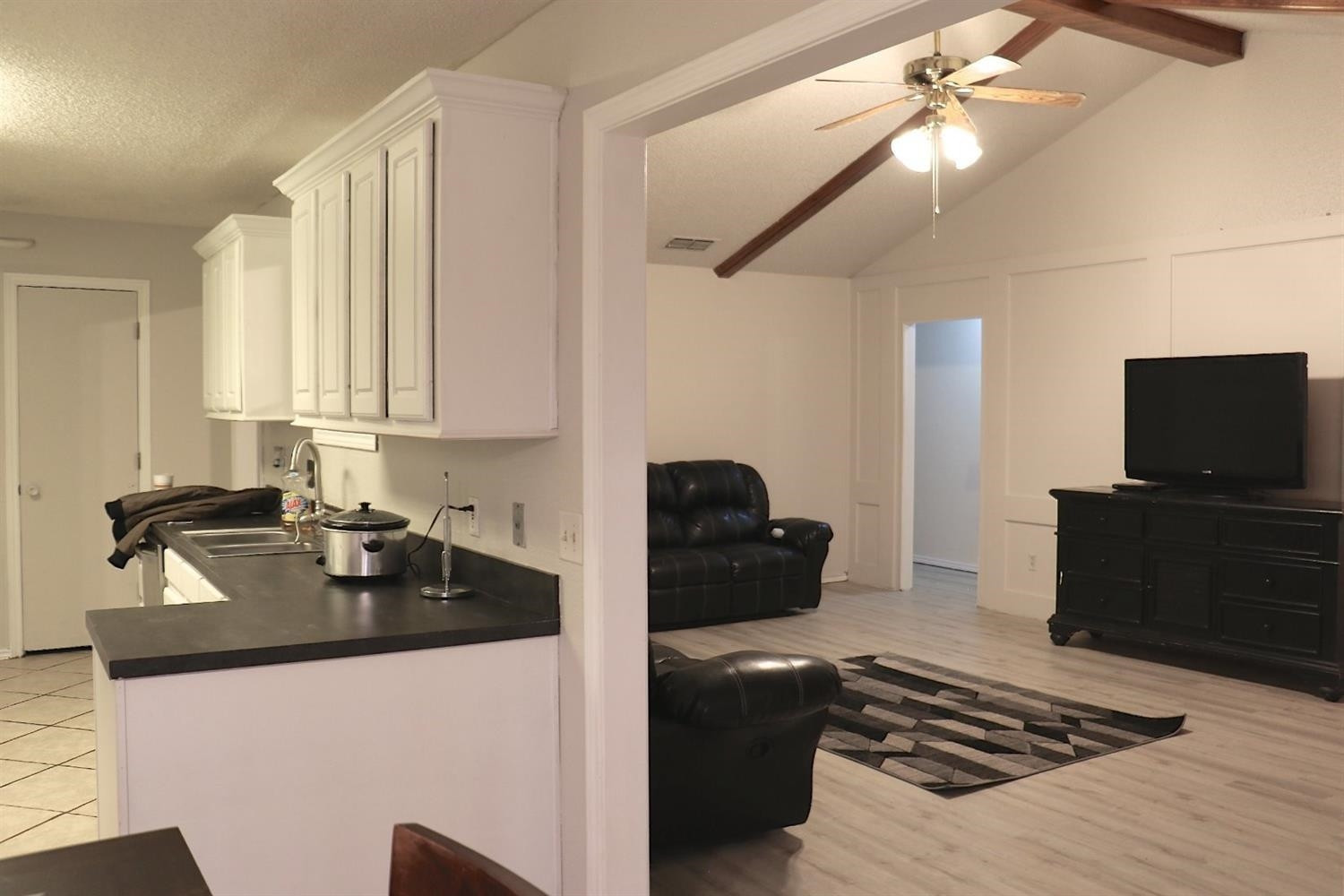 7004 Elkhart Avenue Lubbock, TX 79424 - Photo 5 of 16 a kitchen with a appliances and cabinets