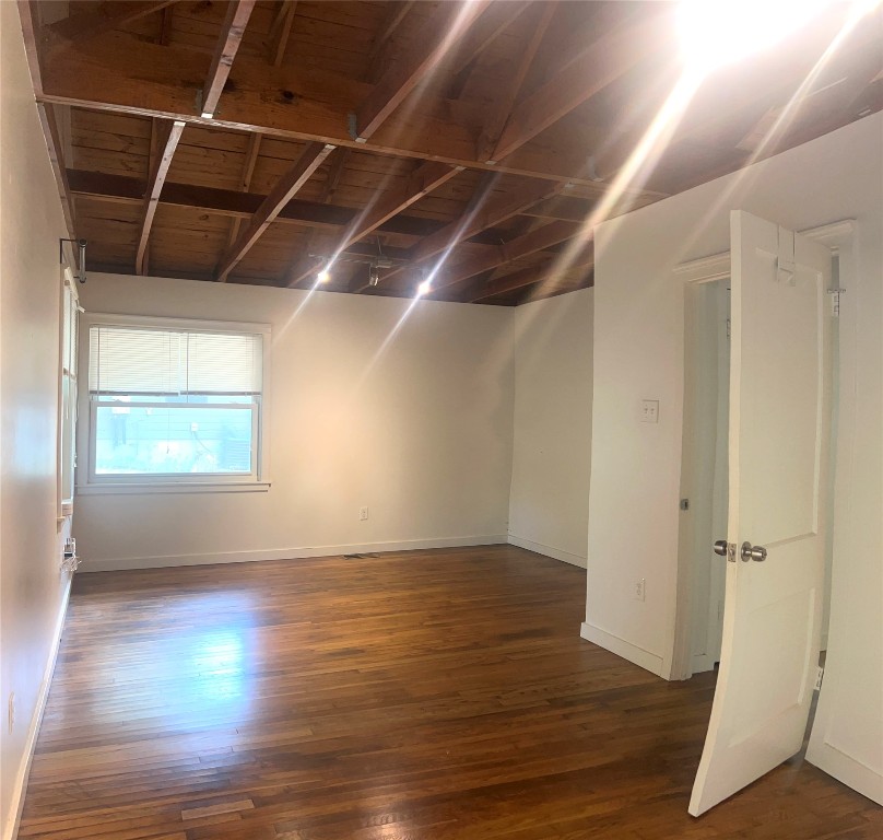 1322 Morgan Lane, Unit B Austin, TX 78704 - Photo 6 of 6 Unfurnished room with dark wood-style flooring and baseboards