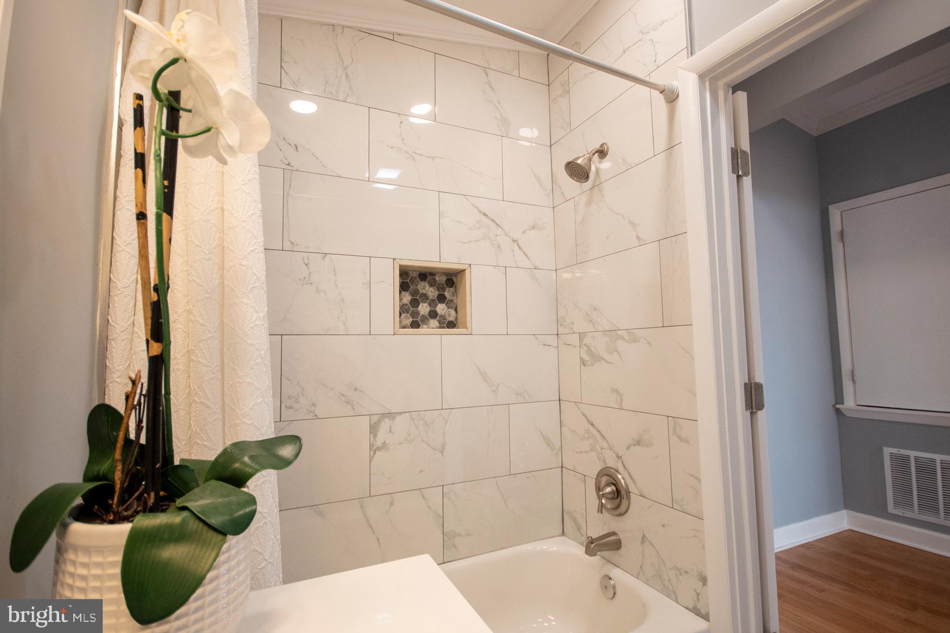 4129 Raleigh Road Pikesville, MD 21208 - Photo 11 of 19 Hall Bathroom