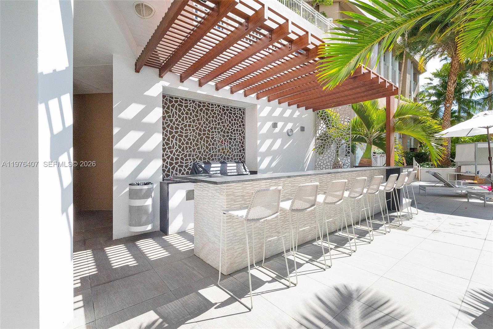 901 Brickell Key Boulevard, Unit 901 Miami, FL 33131 - Photo 28 of 35 a view of backyard with a tub