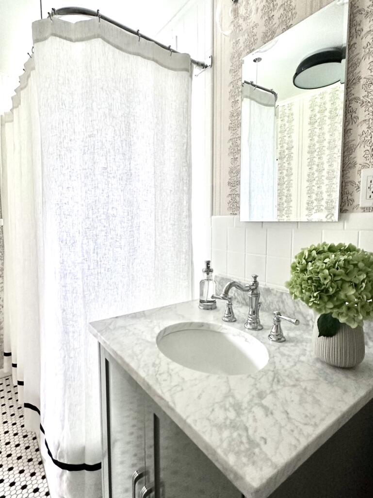 4 Dunaskin Road Centerville, MA 02632 - Photo 18 of 27 a bathroom with a granite countertop sink a mirror and a shower