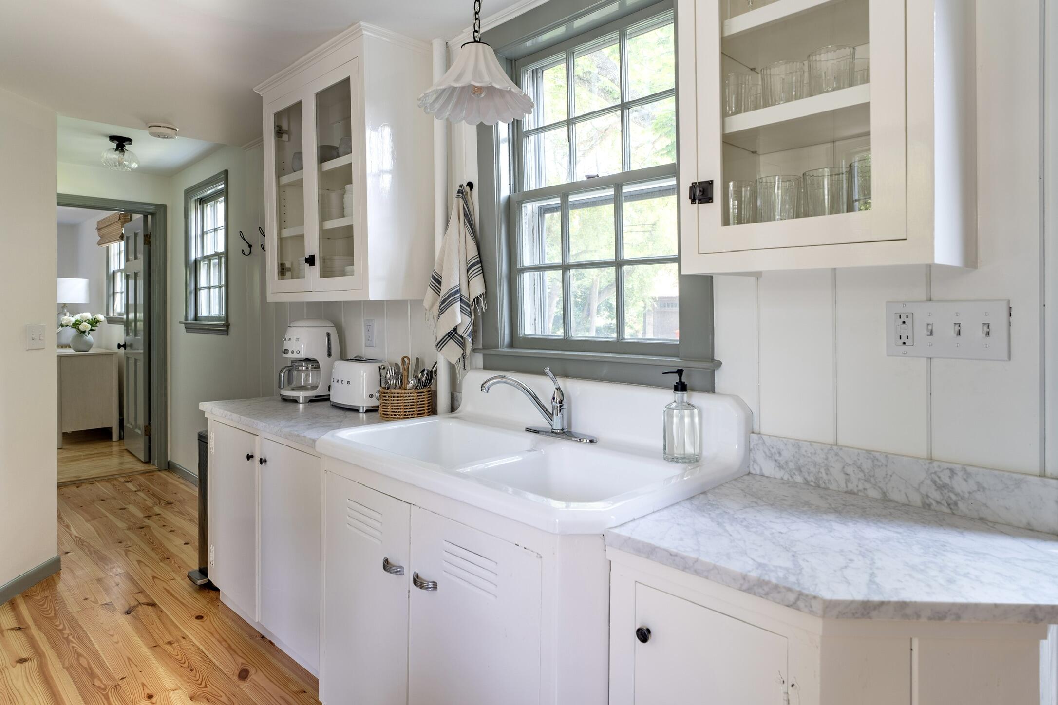 4 Dunaskin Road Centerville, MA 02632 - Photo 8 of 27 a kitchen with a sink cabinets and window