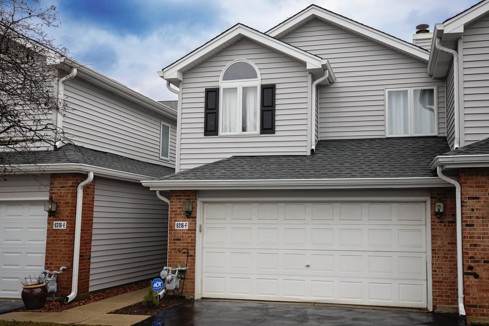 a view of a house with a garage