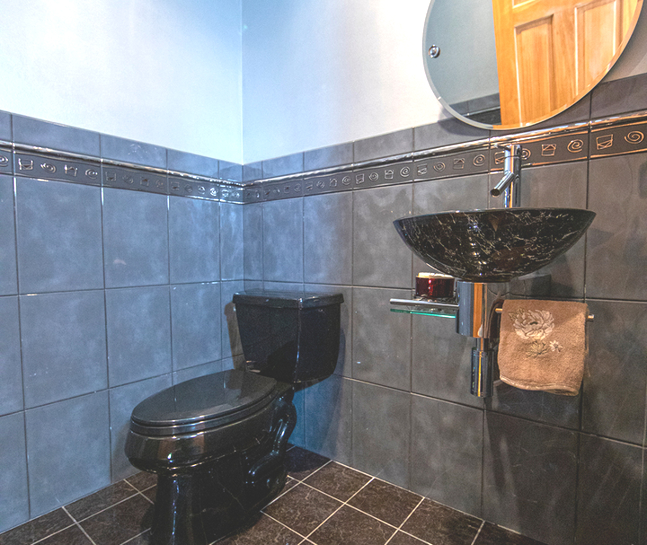 8316 High Point Circle, Unit F Darien, IL 60561 - Photo 22 of 24 a close view of a sink and a mirror