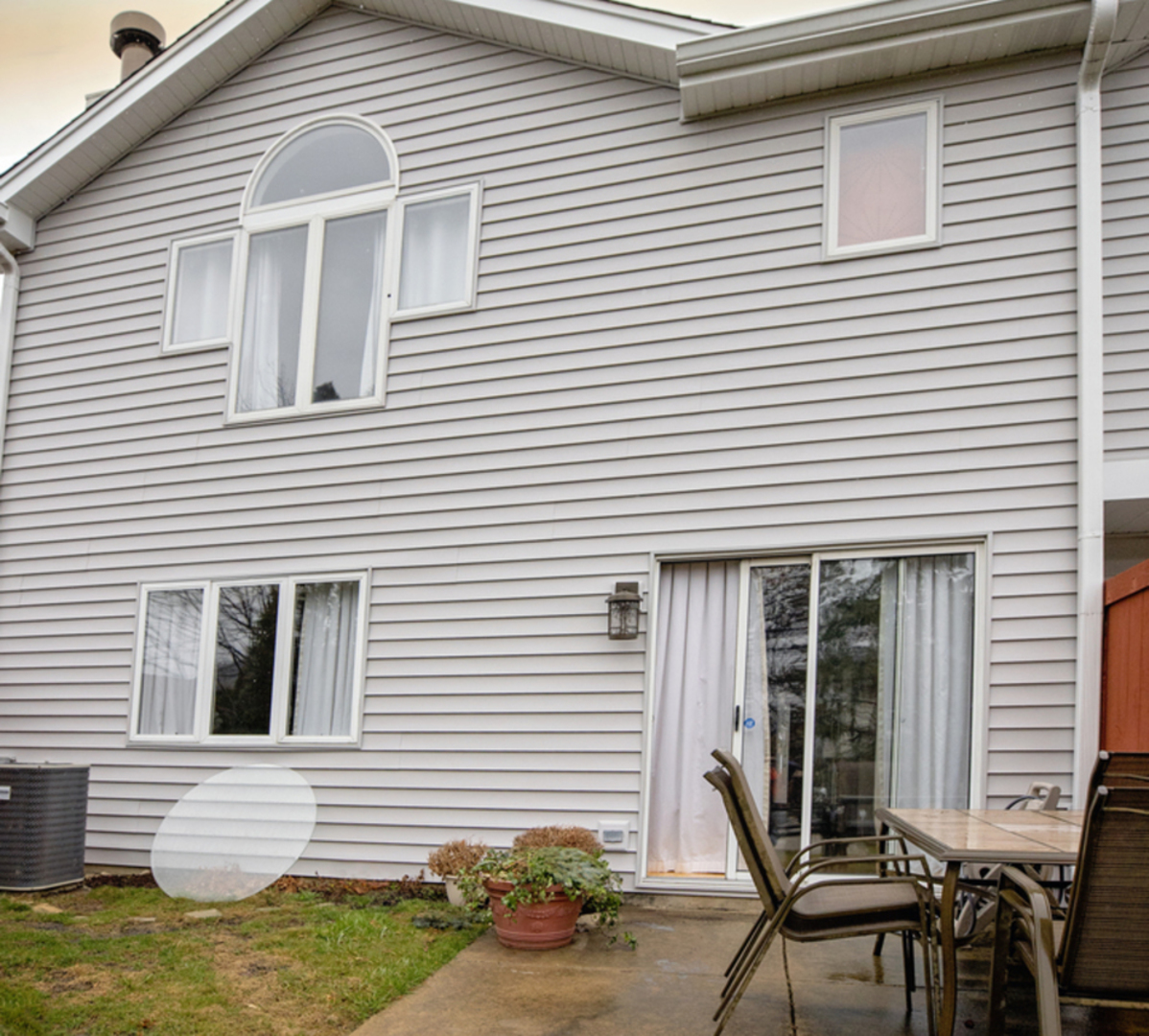 8316 High Point Circle, Unit F Darien, IL 60561 - Photo 23 of 24 a view of a house with a patio