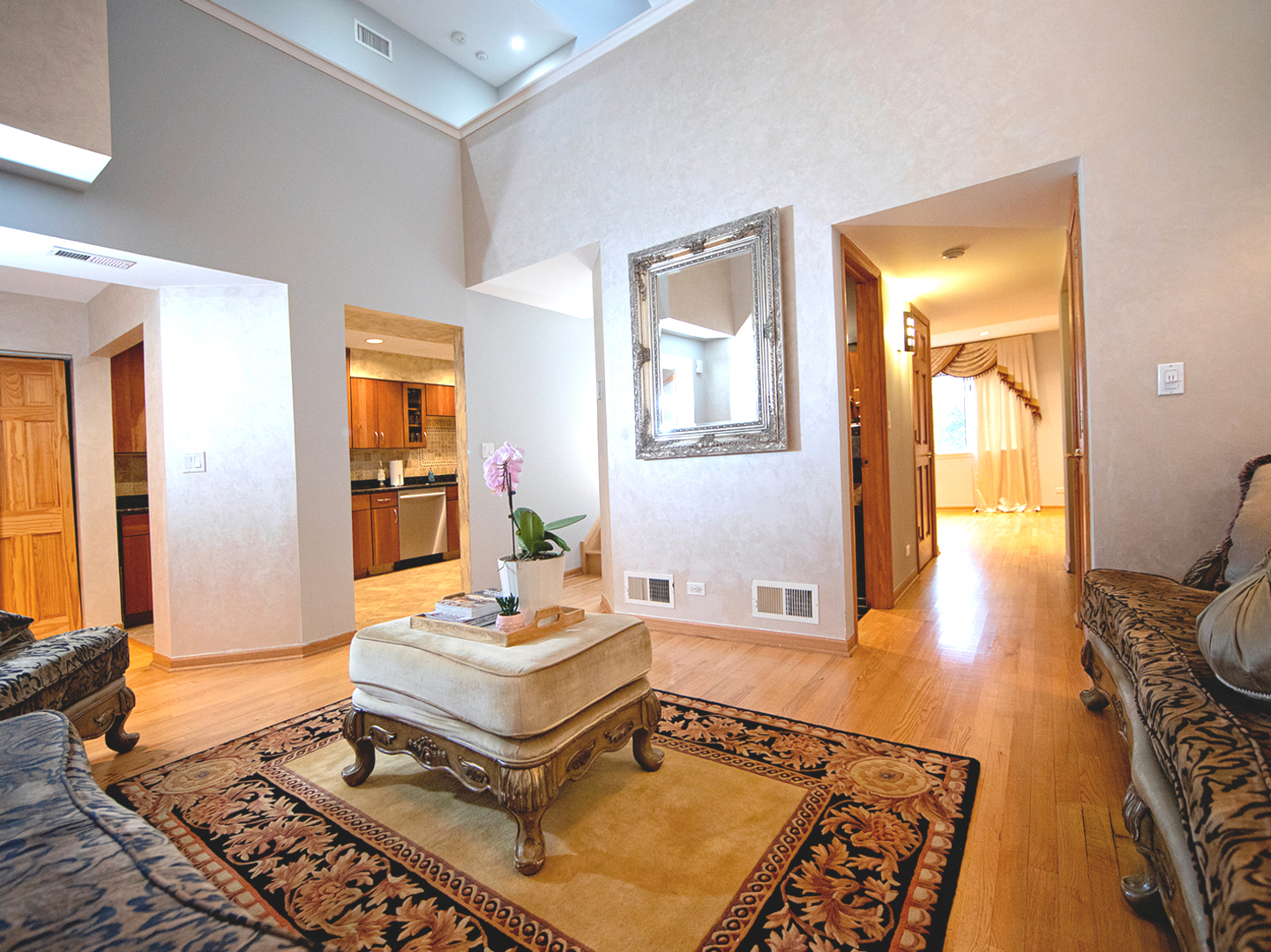 8316 High Point Circle, Unit F Darien, IL 60561 - Photo 5 of 24 a living room with a couch and wooden floor