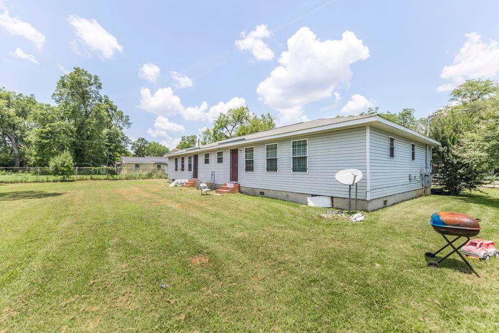 210 Perry Railroad Street Fort Valley, GA 31030 - Photo 23 of 45 a view of a house with backyard and sitting area