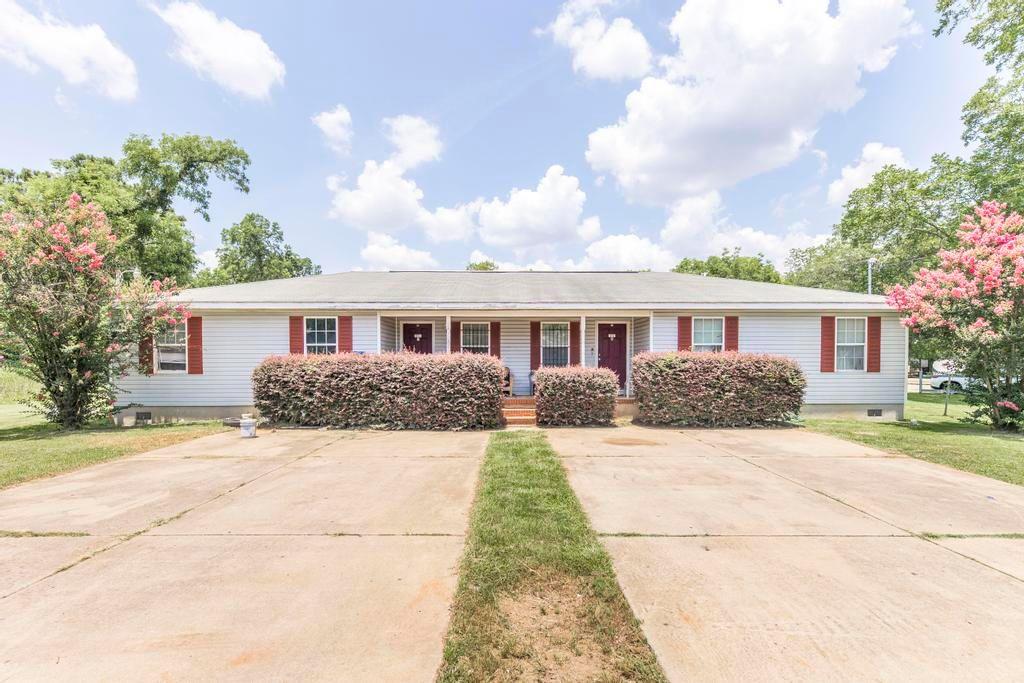 210 Perry Railroad Street Fort Valley, GA 31030 - Photo 25 of 45 a front view of house with yard and trees around