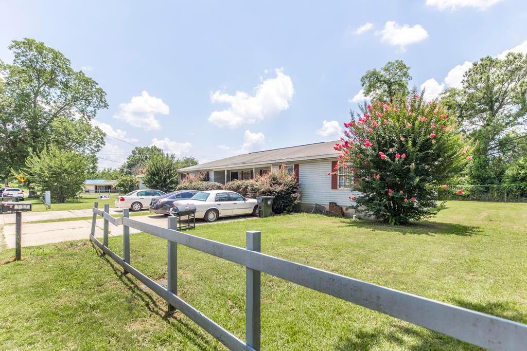 210 Perry Railroad Street Fort Valley, GA 31030 - Photo 3 of 45 a view of a house with backyard and sitting area