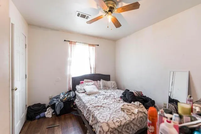 a view of a kitchen area with furniture and stove
