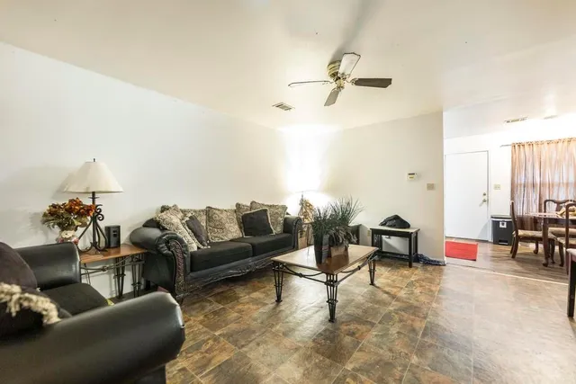a kitchen with stainless steel appliances a sink stove and cabinets
