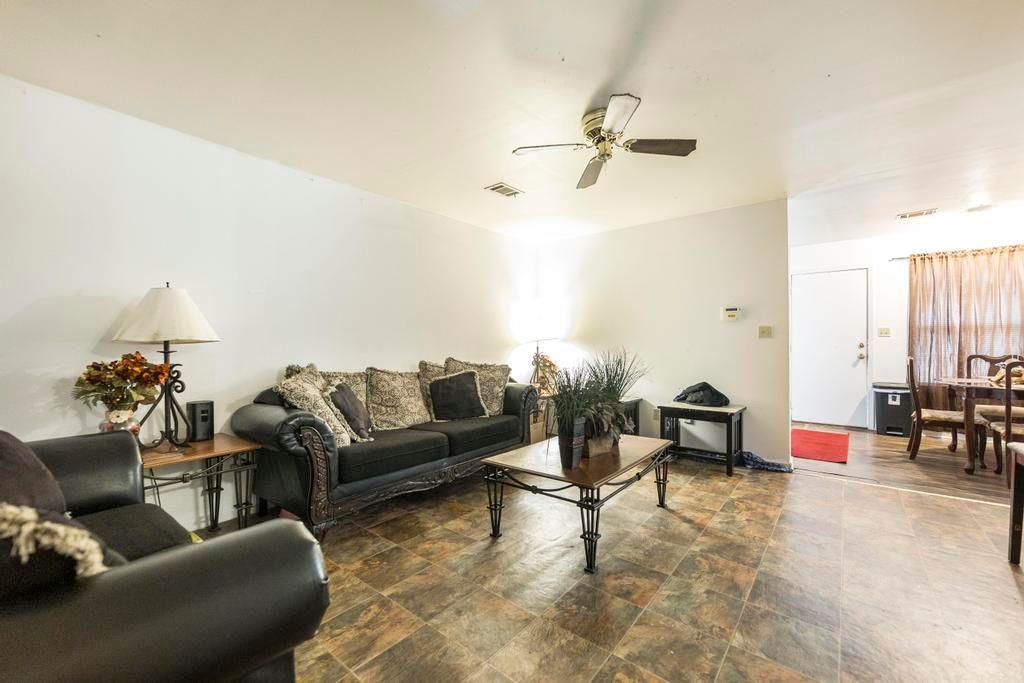 210 Perry Railroad Street Fort Valley, GA 31030 - Photo 4 of 45 a living room with furniture and a rug