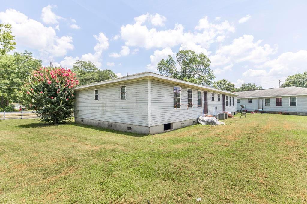 210 Perry Railroad Street Fort Valley, GA 31030 - Photo 45 of 45 a view of a house with backyard and sitting area