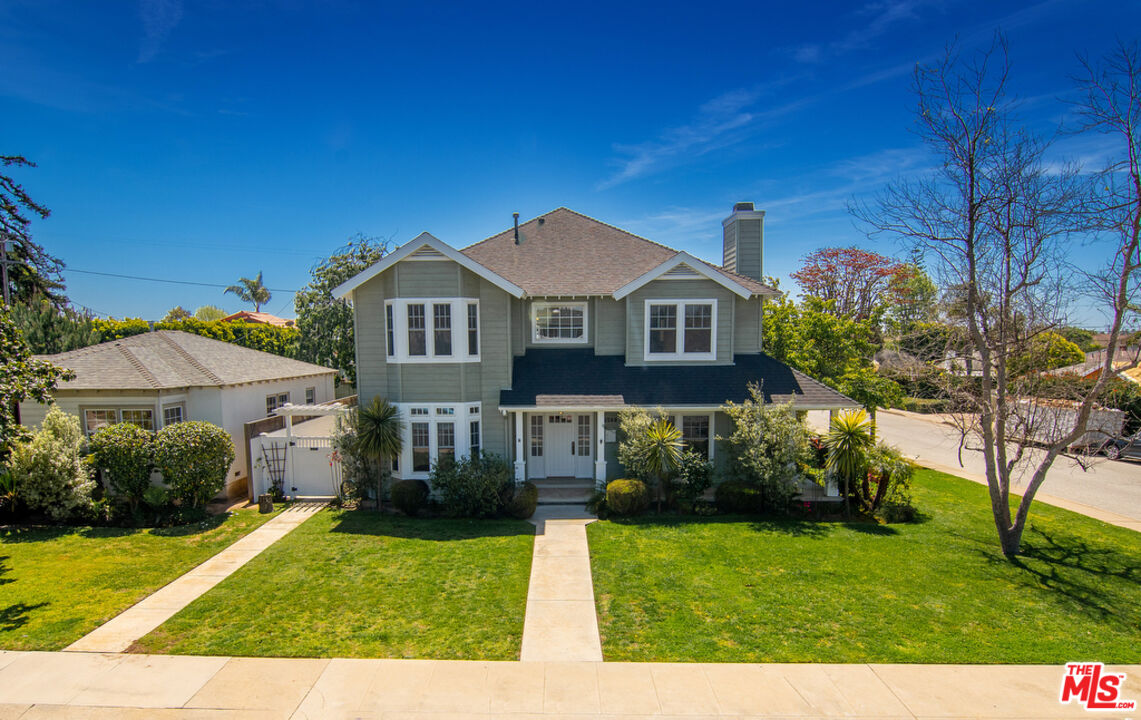 6568 West 81st Street Los Angeles, CA 90045 - Photo 1 of 70 a front view of a house with a yard