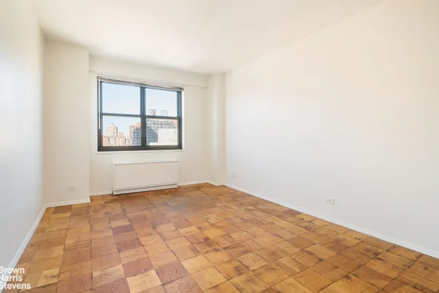 a kitchen with stainless steel appliances granite countertop a sink and a stove