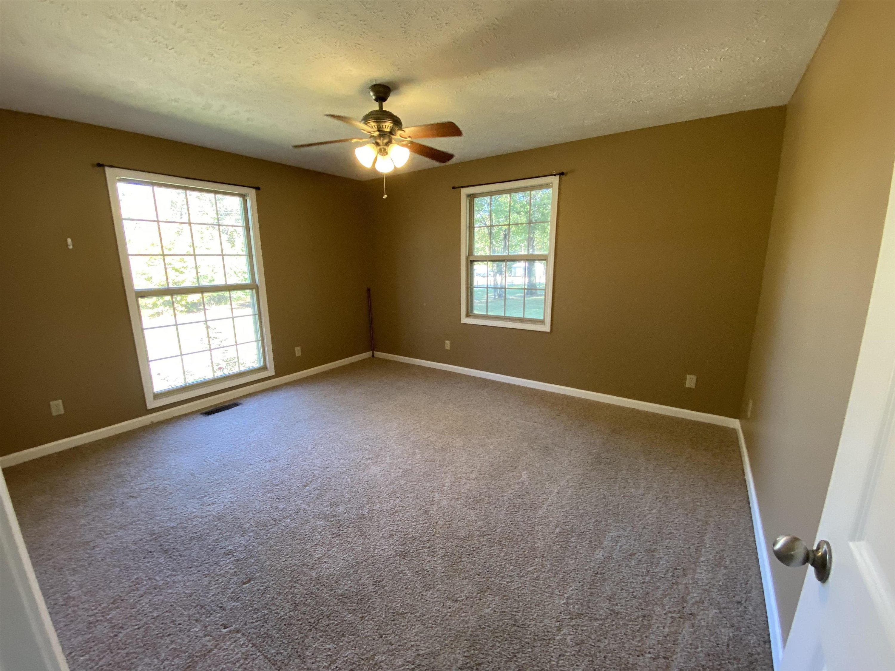 610 Old Finger Road Henderson, TN 38340 - Photo 11 of 24 a view of an empty room with a window