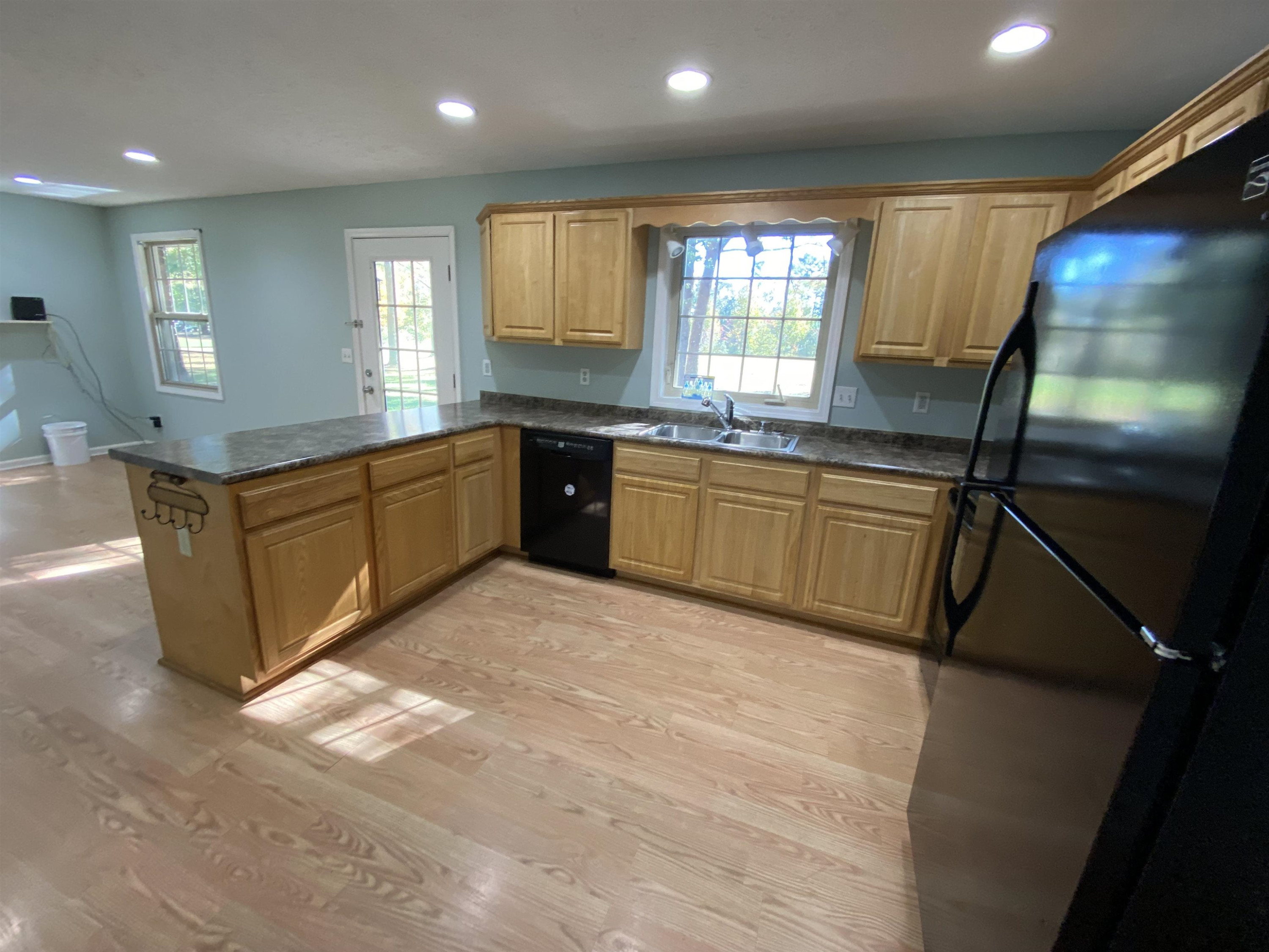 610 Old Finger Road Henderson, TN 38340 - Photo 17 of 24 a large kitchen with window and stainless steel appliances
