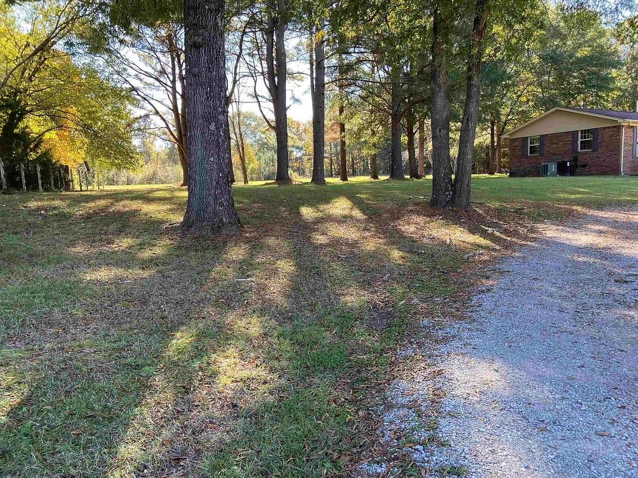 610 Old Finger Road Henderson, TN 38340 - Photo 24 of 24 a view of a house with a yard