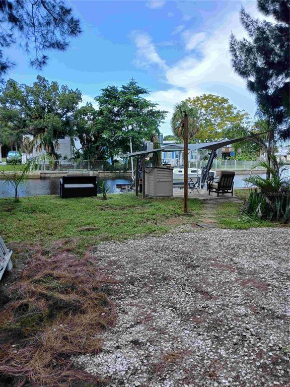 14633 Williams Lane Hudson, FL 34667 - Photo 12 of 26 a view of a garden with a house
