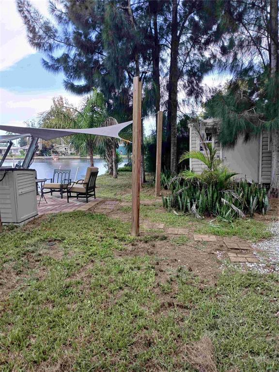 14633 Williams Lane Hudson, FL 34667 - Photo 15 of 26 a view of a backyard with garden