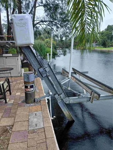 a view of a balcony with chairs