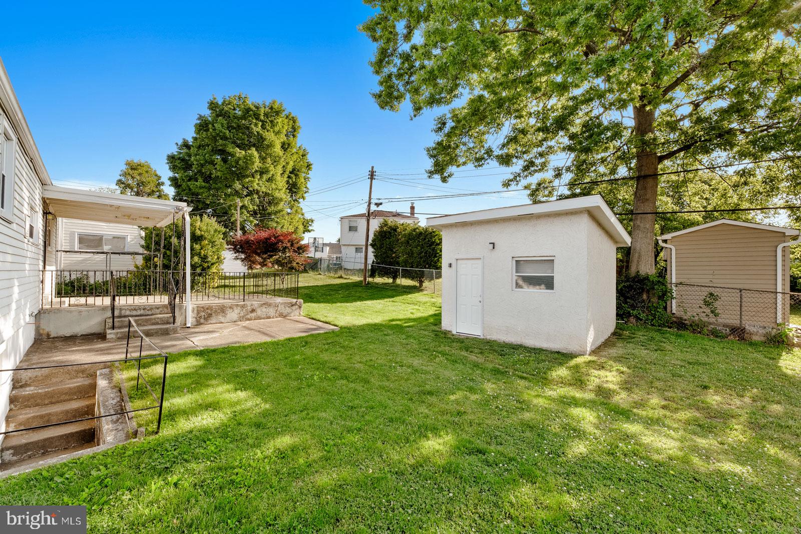 823 Rennard Street Philadelphia, PA 19116 - Photo 38 of 40 Spacious yard with charming outbuilding.