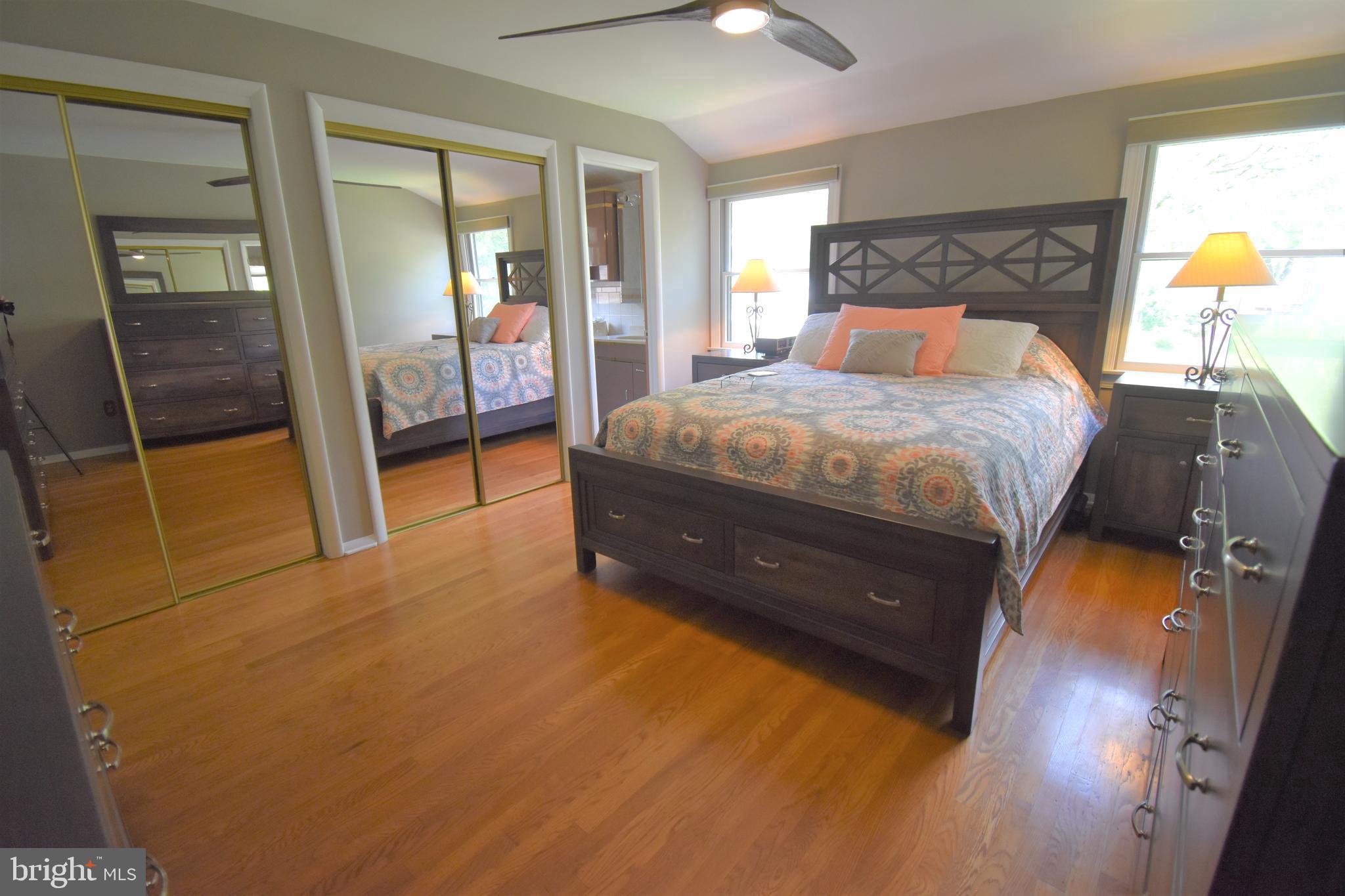 8 Forge Lane Cherry Hill, NJ 08002 - Photo 13 of 23 a bed sitting in a bedroom next to a window