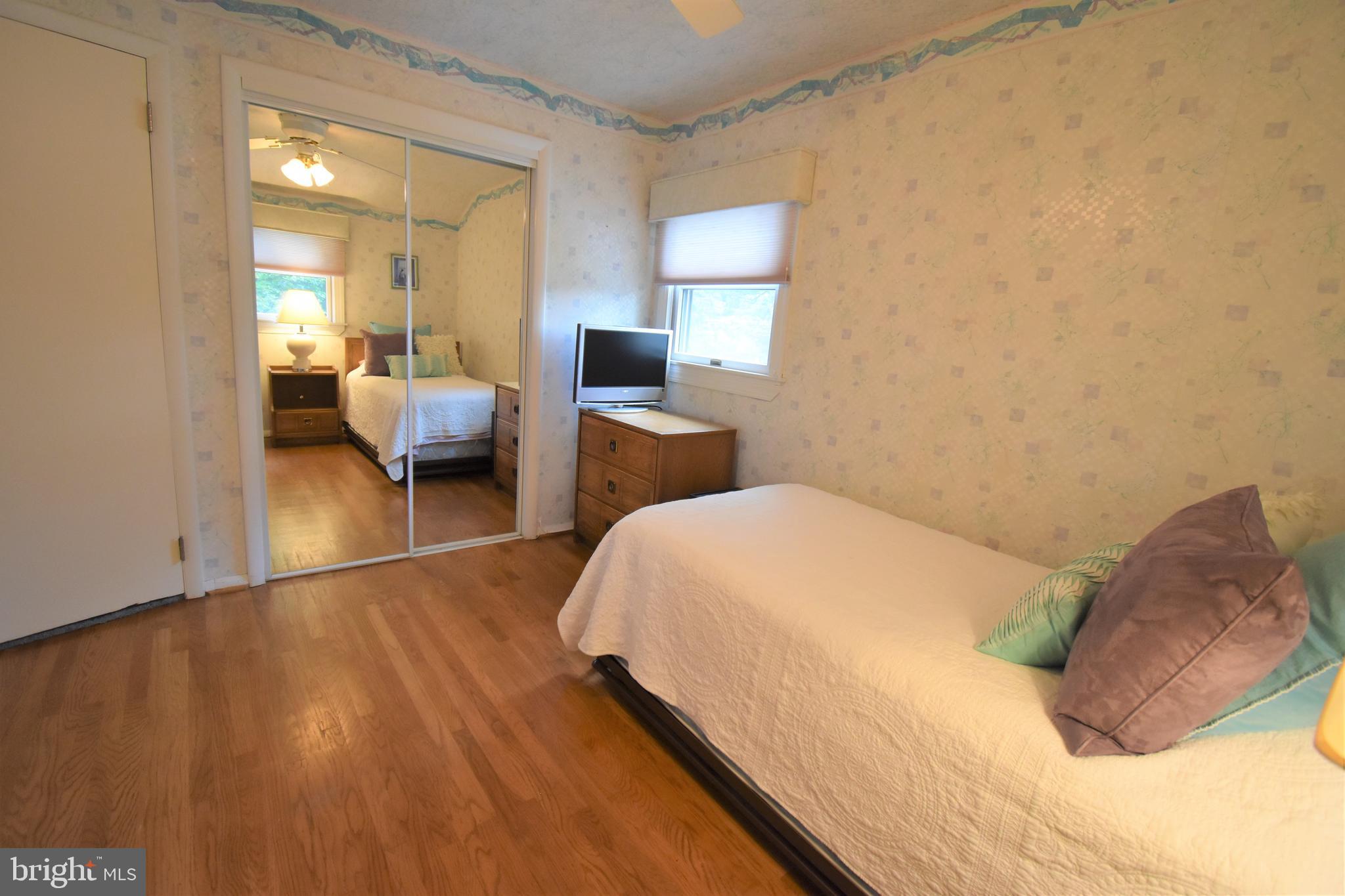 8 Forge Lane Cherry Hill, NJ 08002 - Photo 16 of 23 a bedroom with a bed and a chair