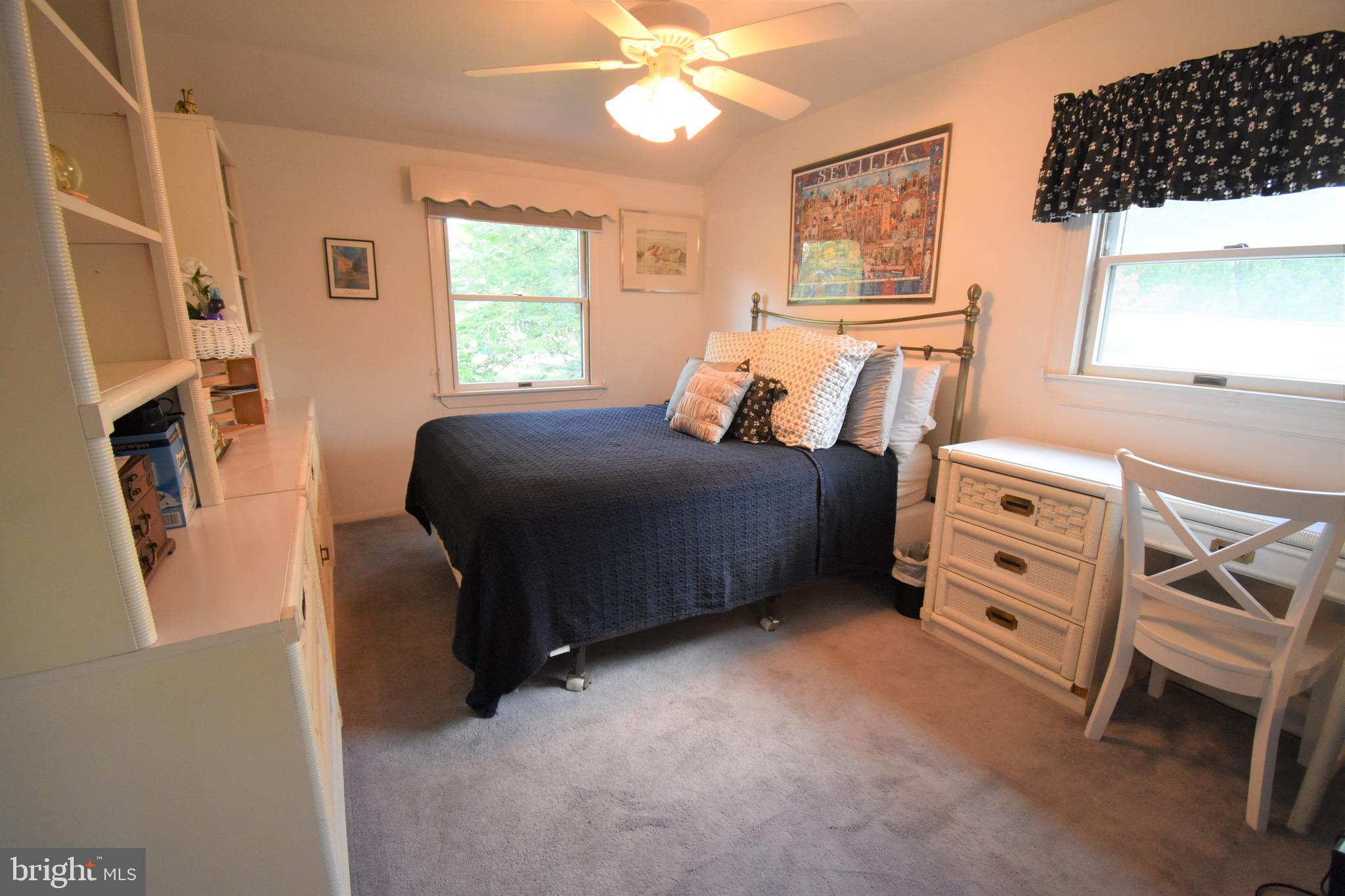 8 Forge Lane Cherry Hill, NJ 08002 - Photo 17 of 23 a bedroom with a bed and a flat tv screen on dresser