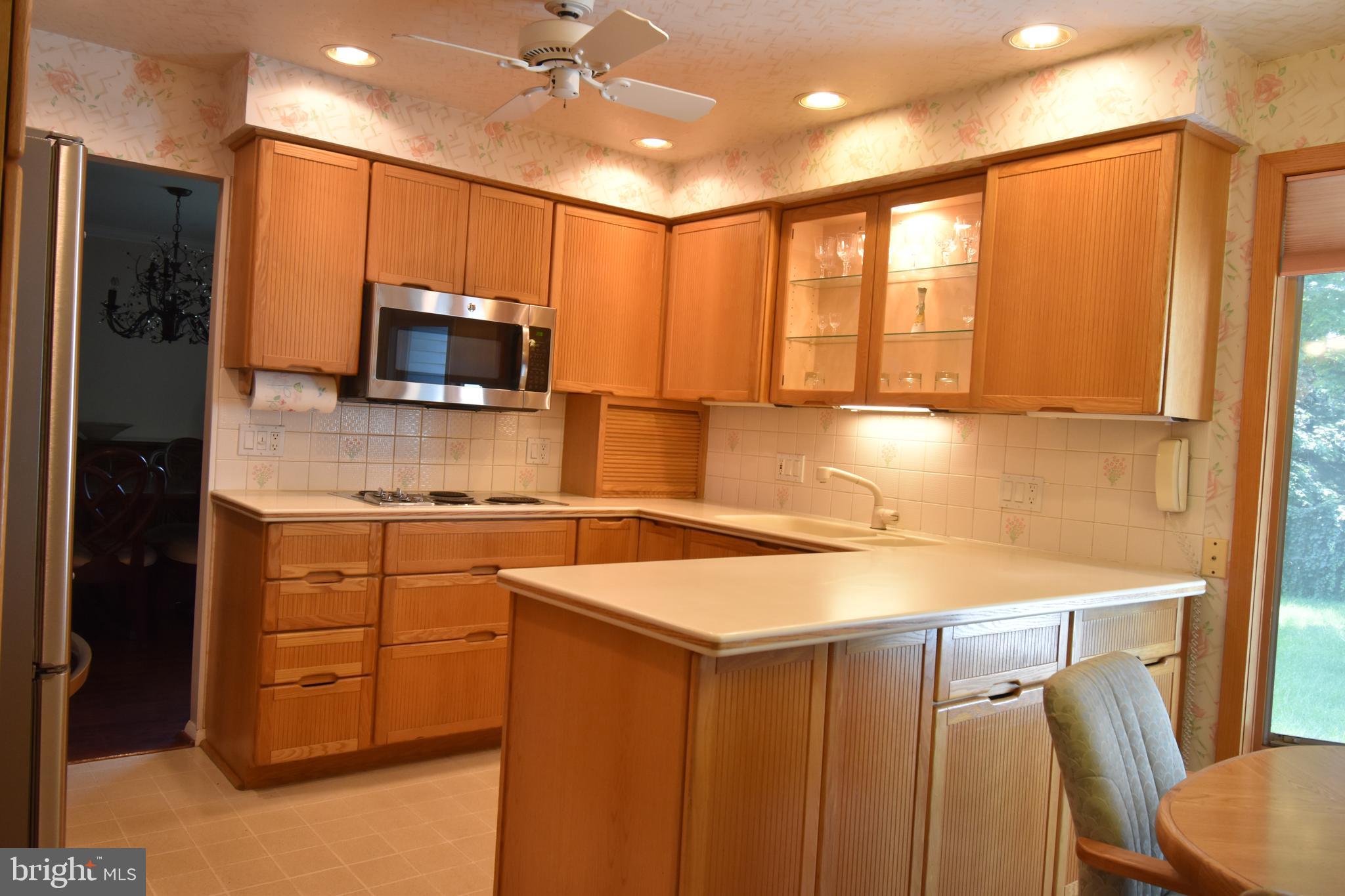 8 Forge Lane Cherry Hill, NJ 08002 - Photo 6 of 23 a kitchen with kitchen island a counter top space appliances and a sink