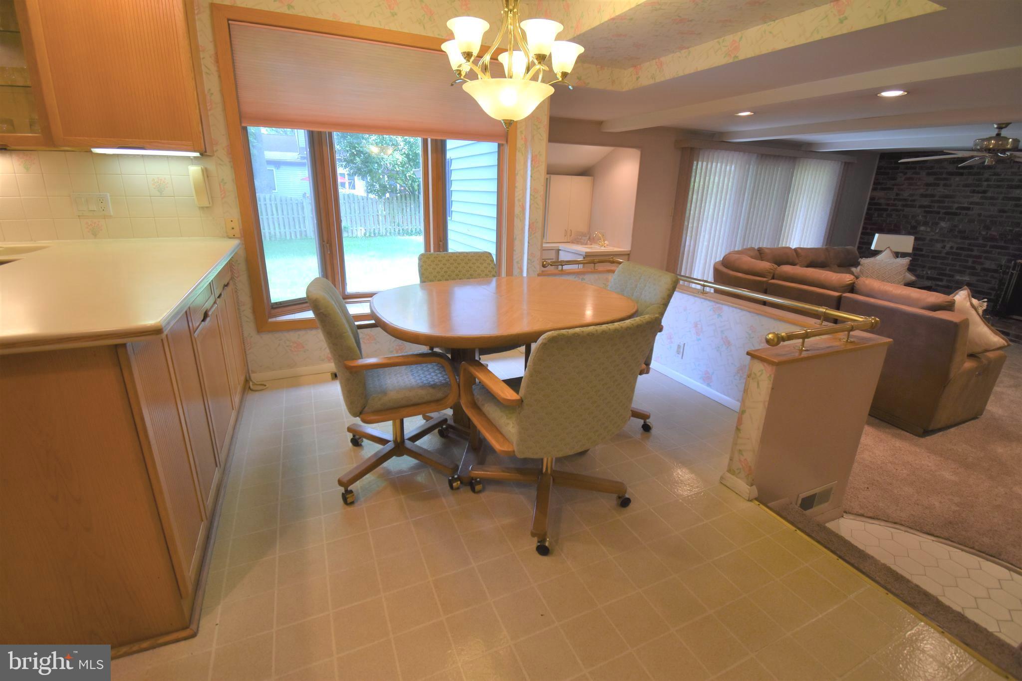 8 Forge Lane Cherry Hill, NJ 08002 - Photo 10 of 23 a view of a dining room with furniture and a chandelier