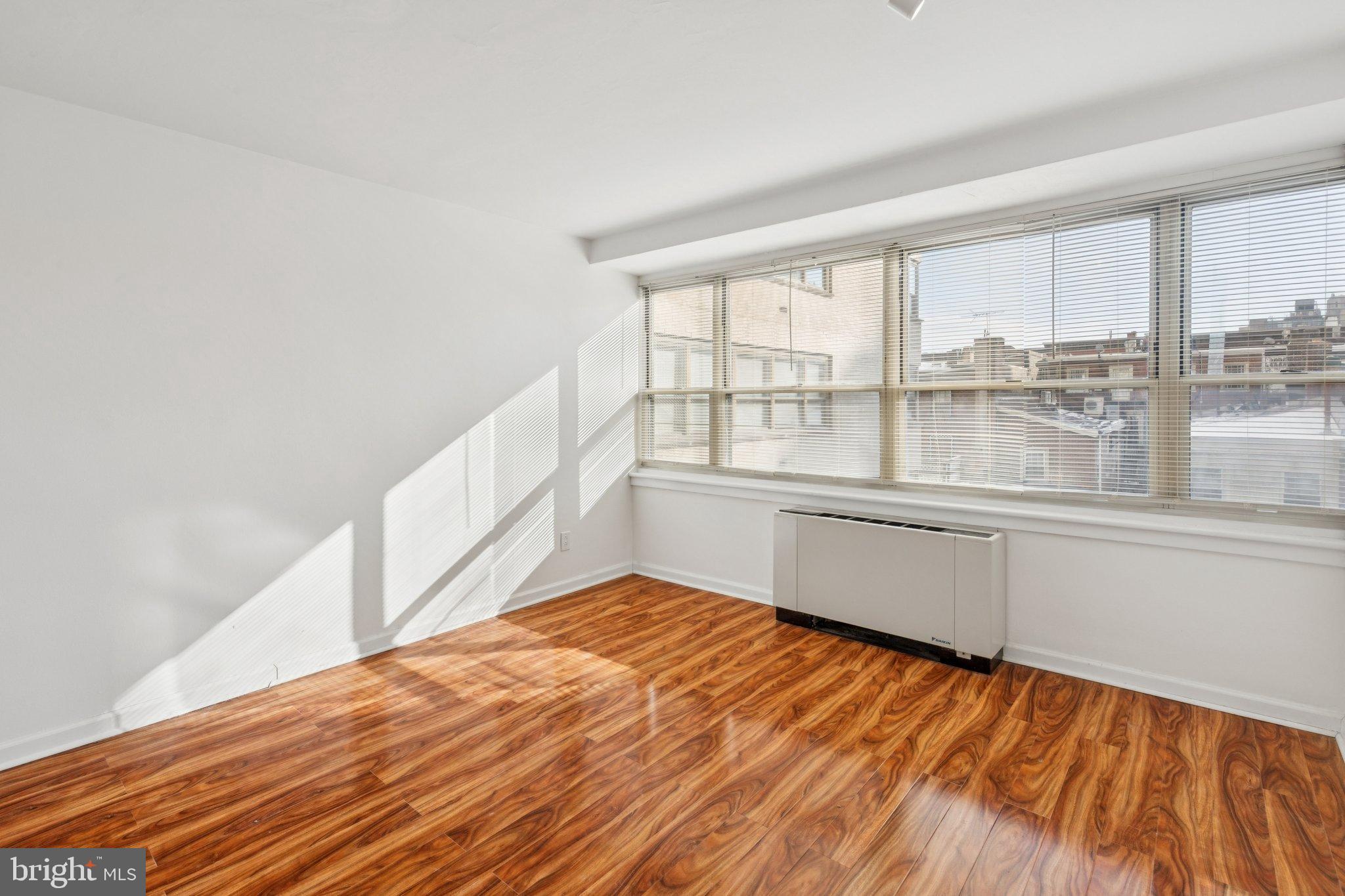 1810 Rittenhouse Square, Unit 406 Philadelphia, PA 19103 - Photo 2 of 17 Bright, airy space with sunlit hardwood floors.