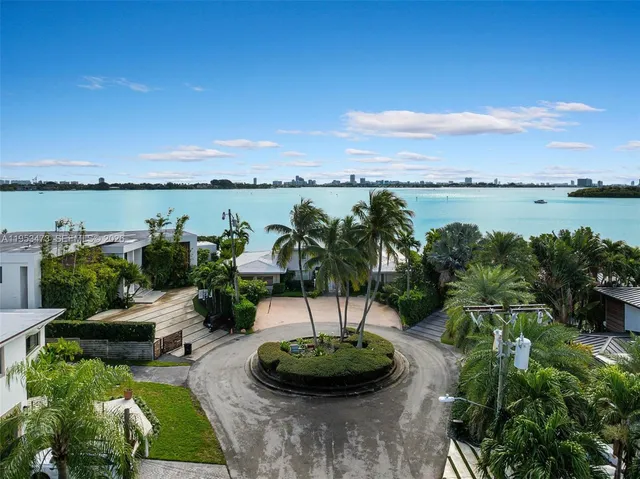 a view of a lake with a yard