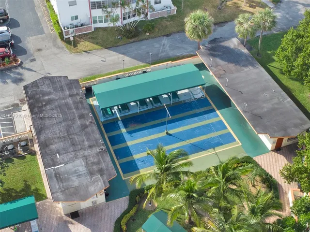 a view of a backyard with a patio