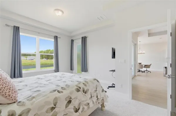a view of a room with window and furniture