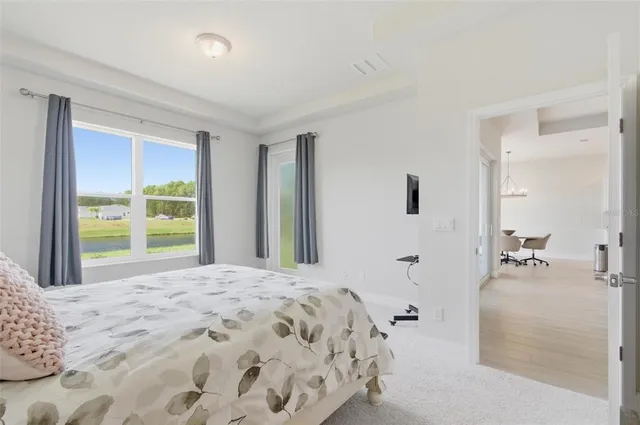 a view of a room with window and furniture