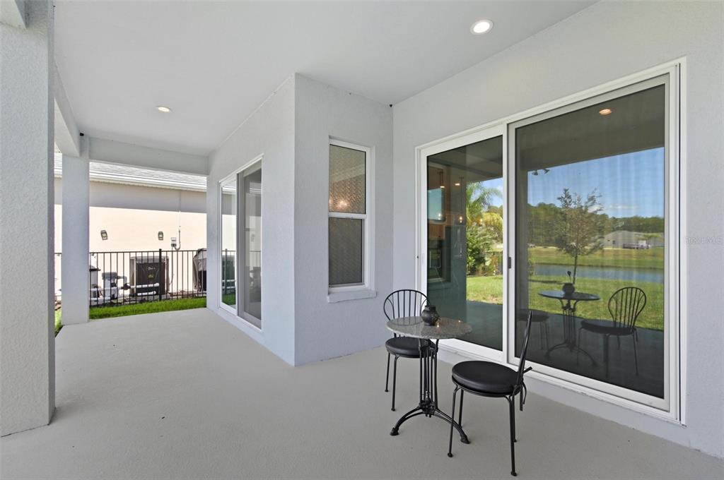 21 Spring Street Palm Coast, FL 32164 - Photo 30 of 57 a view of a room with window and furniture