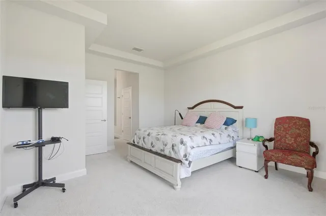 a bathroom with double sink and a mirror