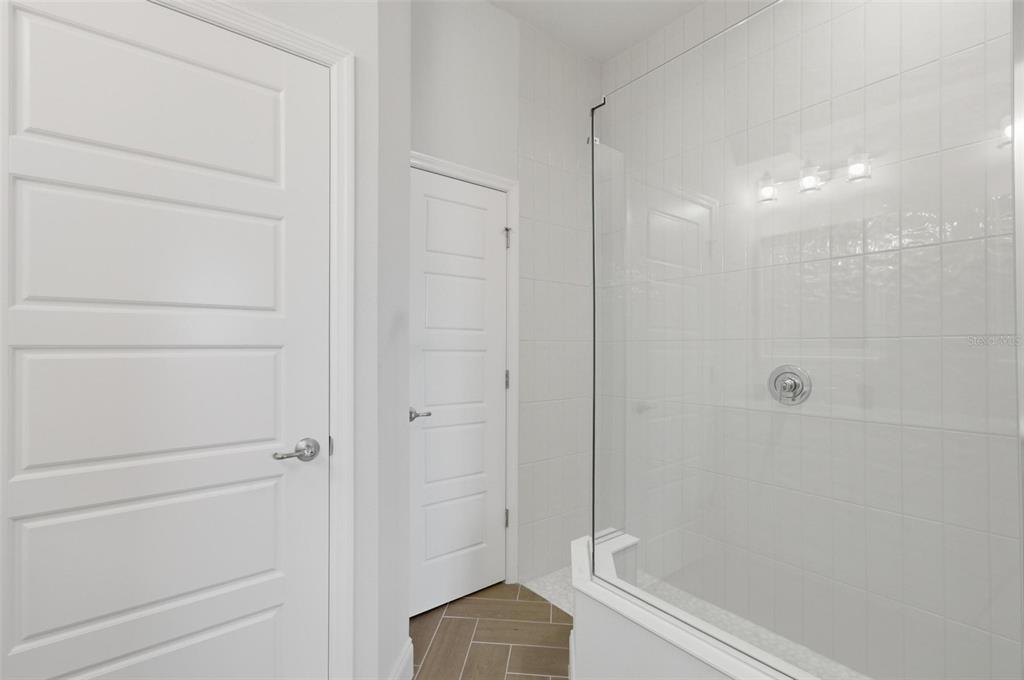 21 Spring Street Palm Coast, FL 32164 - Photo 35 of 57 a bathroom with a shower