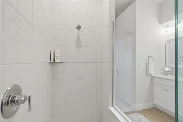 a view of a livingroom with a dinning area hardwood floor and a kitchen