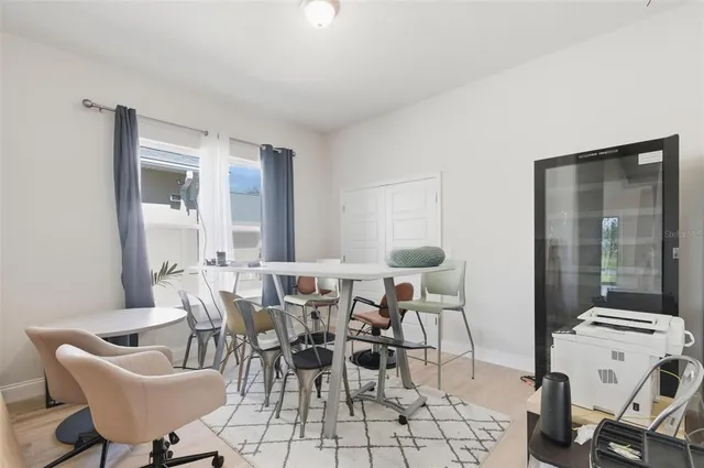 a room with a bed and a window