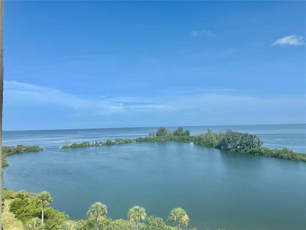 6009 Sea Ranch Drive, Unit 707 Hudson, FL 34667 - Photo 28 of 61 a view of a lake with a city view
