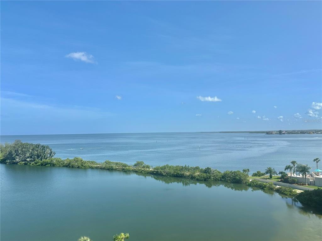 6009 Sea Ranch Drive, Unit 707 Hudson, FL 34667 - Photo 41 of 61 a view of an ocean with beach and outdoor space