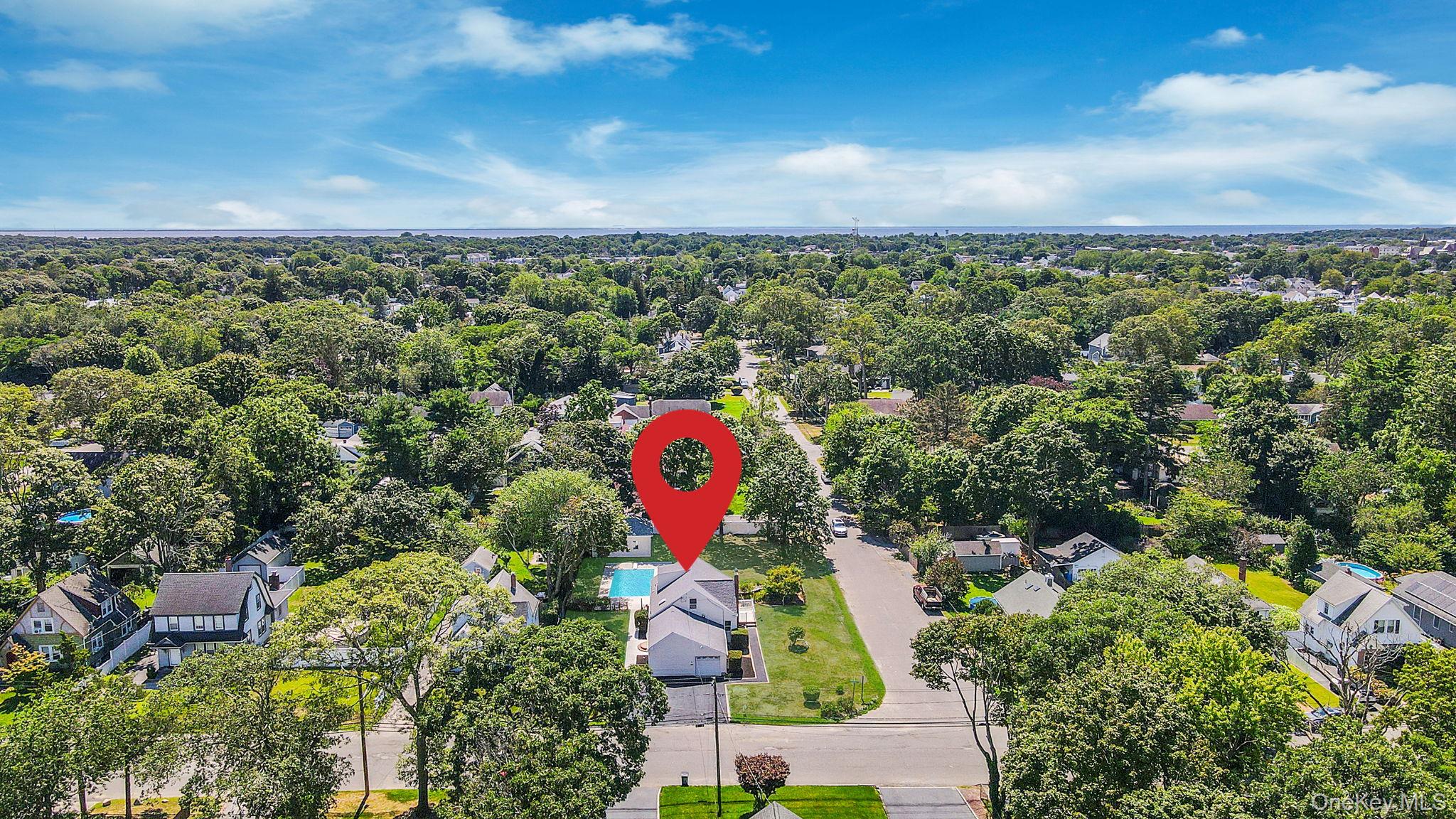 48 Vernon Street Patchogue, NY 11772 - Photo 28 of 31 Aerial perspective of suburban area