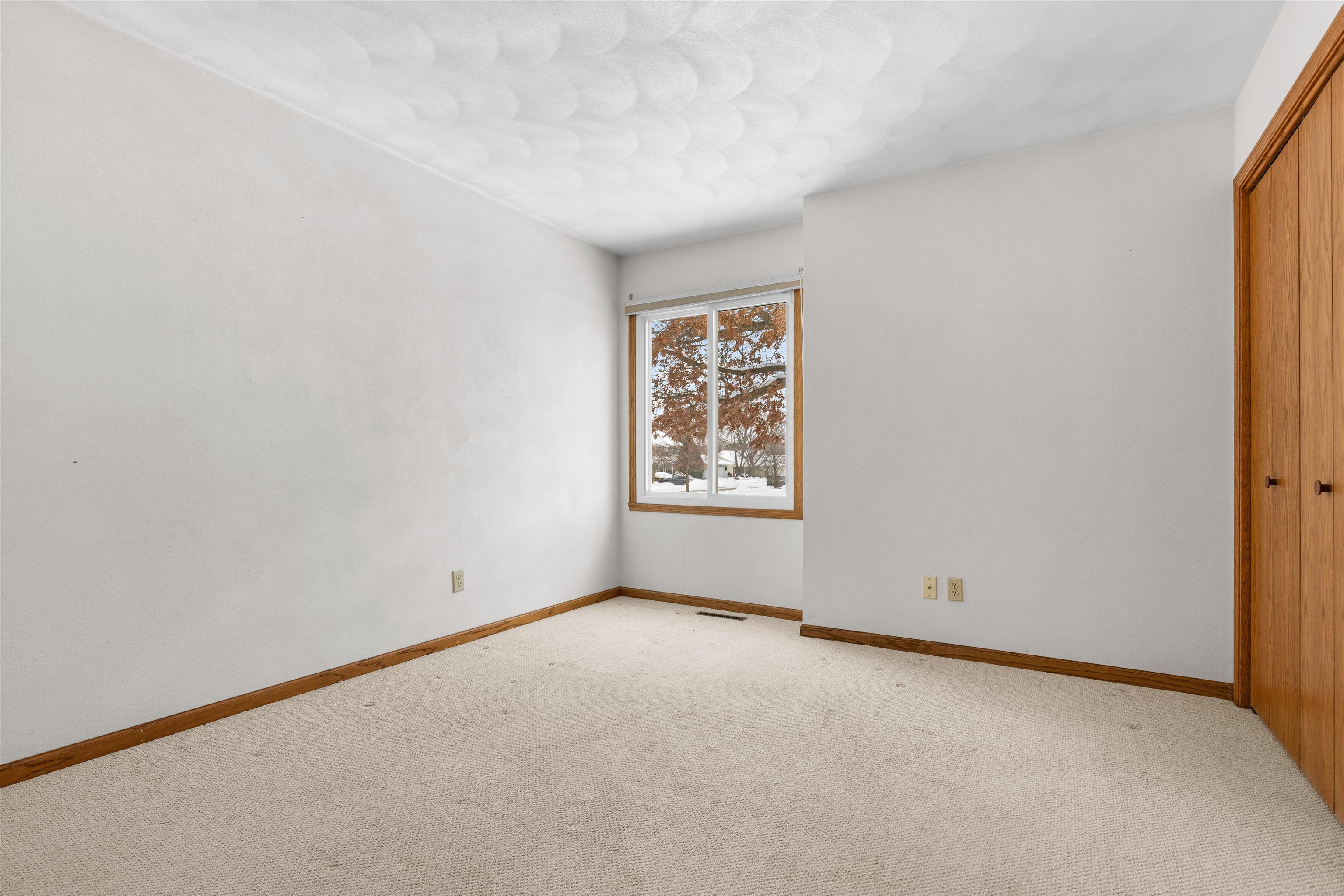 6644 North Point Road Rockford, IL 61108 - Photo 14 of 19 an empty room with windows
