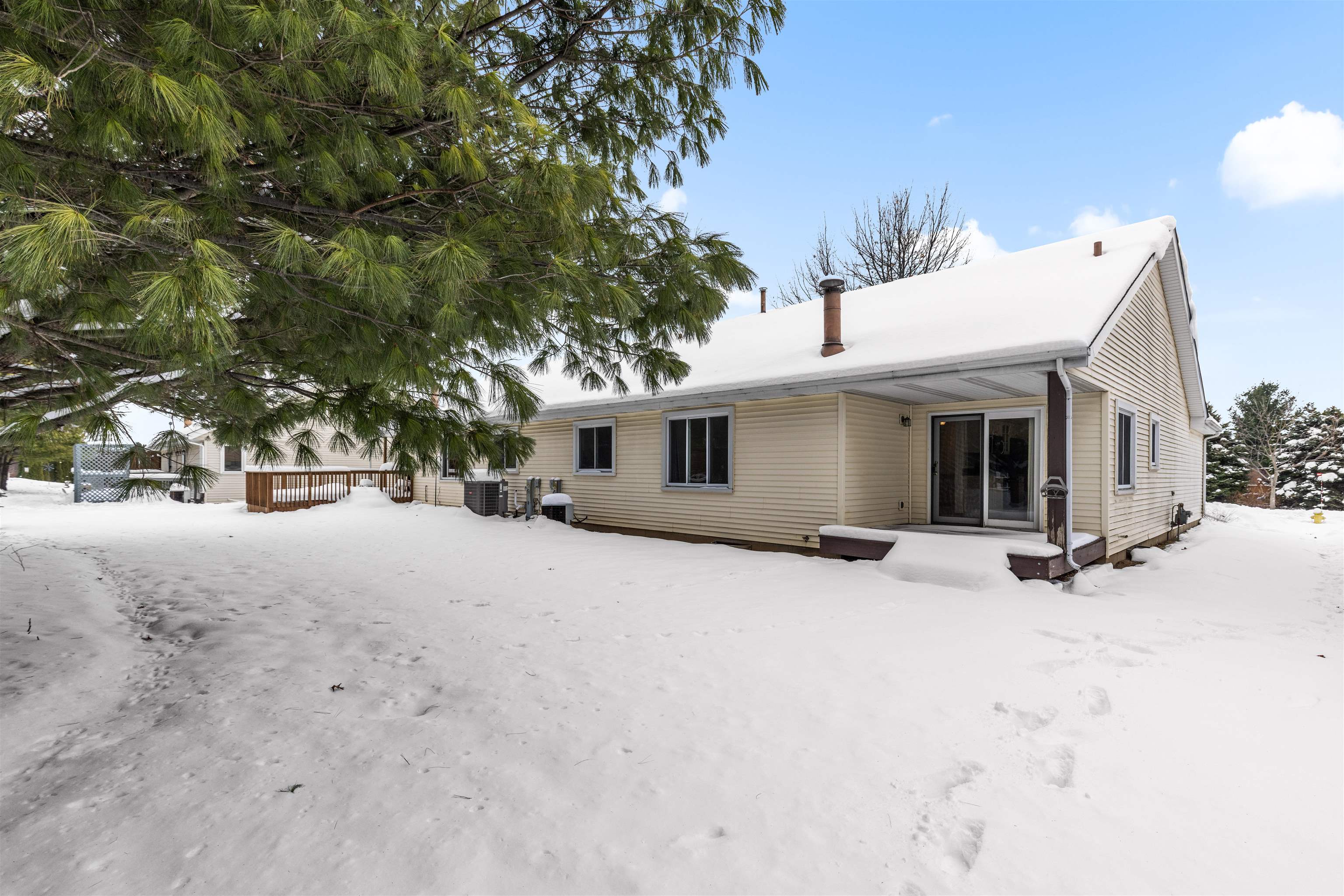 6644 North Point Road Rockford, IL 61108 - Photo 18 of 19 a view of a house with a snow in the yard