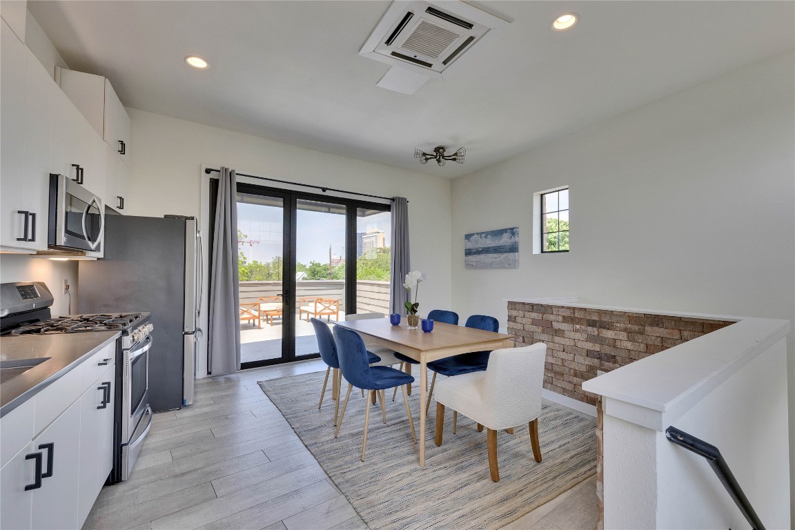 808 Lydia Street Austin, TX 78702 - Photo 15 of 40 a dining room with furniture and window
