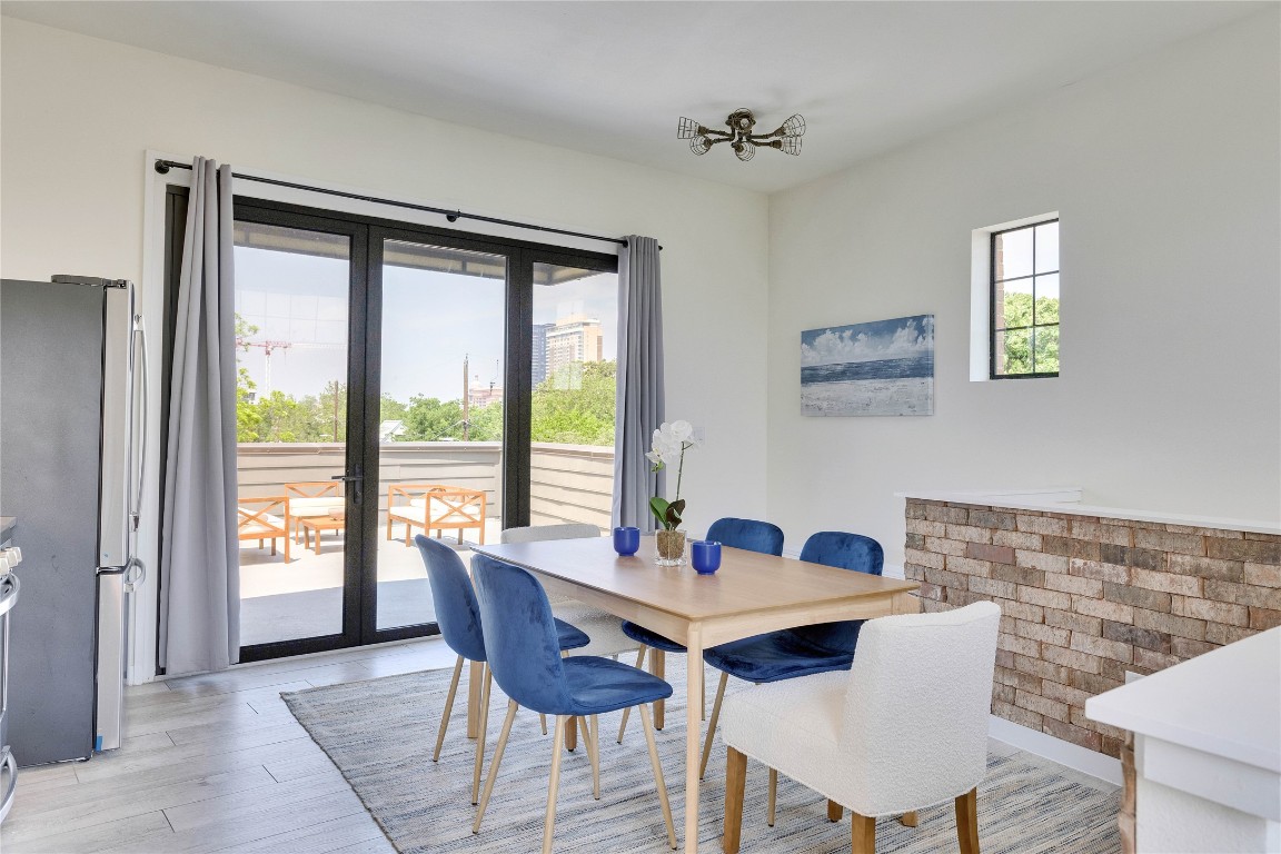 808 Lydia Street Austin, TX 78702 - Photo 16 of 40 a view of a dining room with furniture window and outside view